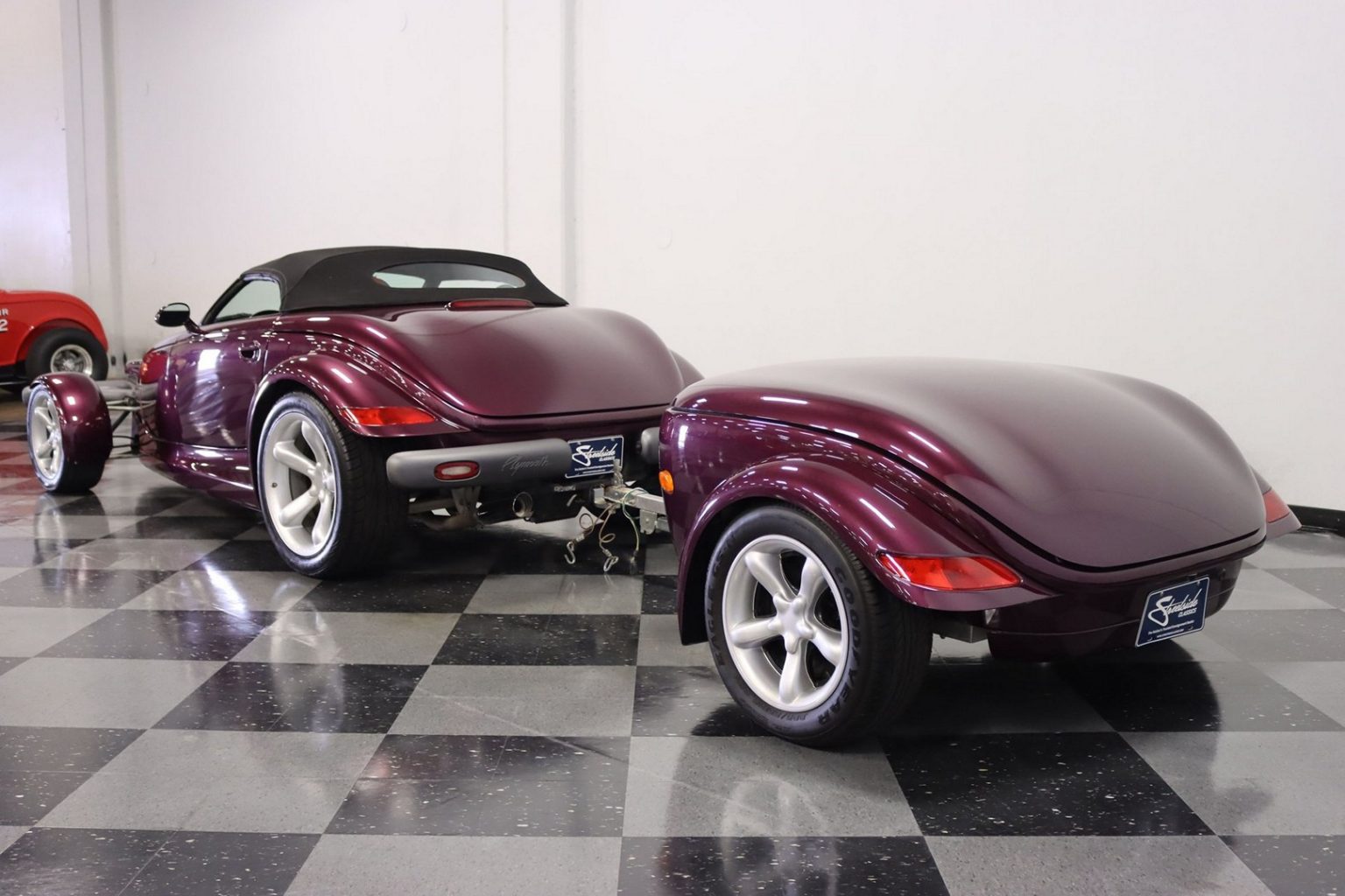 How Much Does a Purple 1999 Plymouth Prowler With a Matching Trailer Cost?